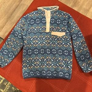 Girl’s Patagonia pullover fleece jacket, blue print w:pink accent. Size XL or 14